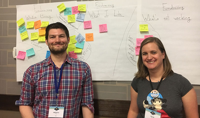 Matthew Poe and Sarah Amin in front of NPSP/nonprofit CRM related ideas at the Denver Open Source Community Sprint, summer 2018